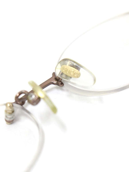 グッチ GG-9004J メガネ ブラウン/クリアオレンジ メタルフレーム リムレス ツーポイント オーバル ITGJPJO7V9TM